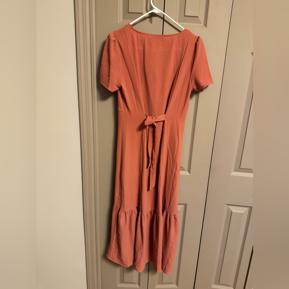 Long button down ruffle  bottom dress